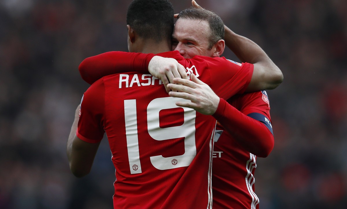 Britain Football Soccer - Manchester United v Reading - FA Cup Third Round - Old Trafford - 7/1/17 Manchester United's Marcus Rashford celebrates scoring their third goal with Wayne Rooney Action ...