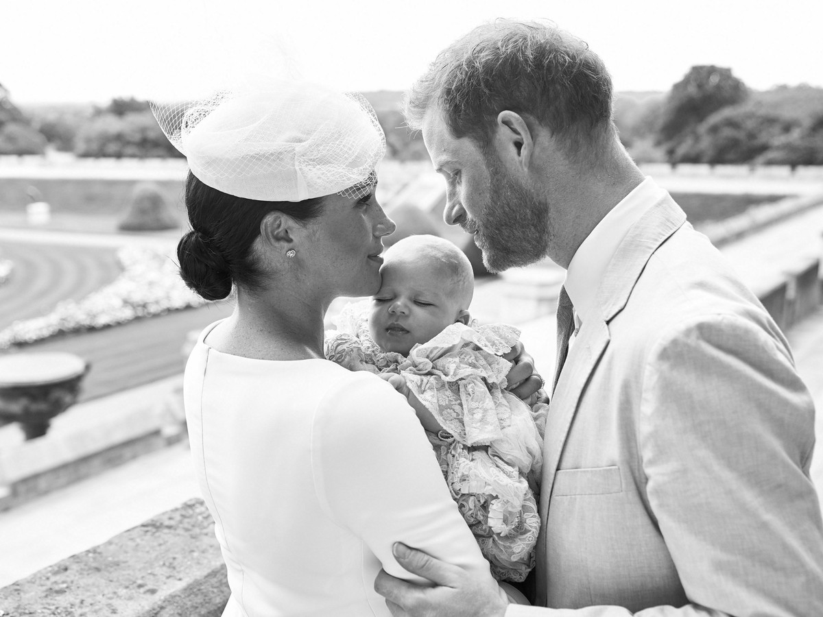 This is an official christening photo released by the Duke and Duchess of Sussex on Saturday, July 6, 2019, showing Britain's Prince Harry, right and Meghan, the Duchess of Sussex with their son  ...