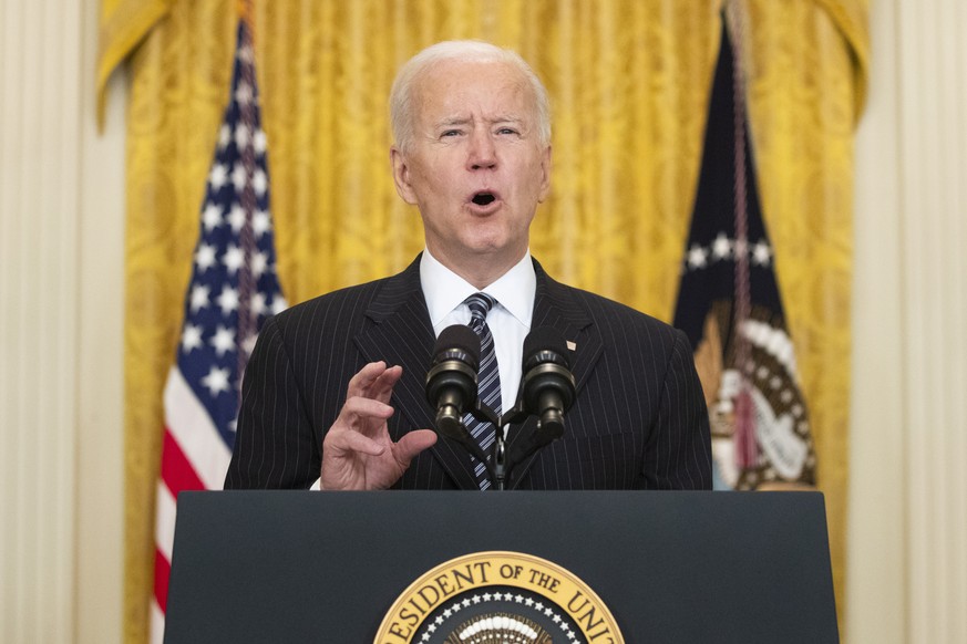 epa09082894 US President Joe Biden delivers remarks on the state of COVID-19 vaccinations, in the East Room of the White House in Washington, DC, USA, 18 March 2021. US President Biden announced the U ...