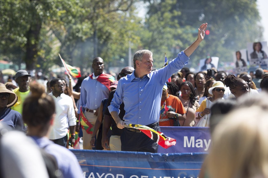 New York Mayor Bill de Blasio walks in the West Indian Day Parade on Monday, Sept. 4, 2017, in the Brooklyn borough of New York. The parade, one of the largest celebrations of Caribbean culture in the ...