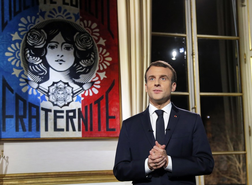 epa07255777 French President Emmanuel Macron gestures after the recording of his New Year&#039;s speech at at the Elysee Palace, in Paris, France, 31 December 2018. EPA/MICHEL EULER / POOL MAXPPP OUT