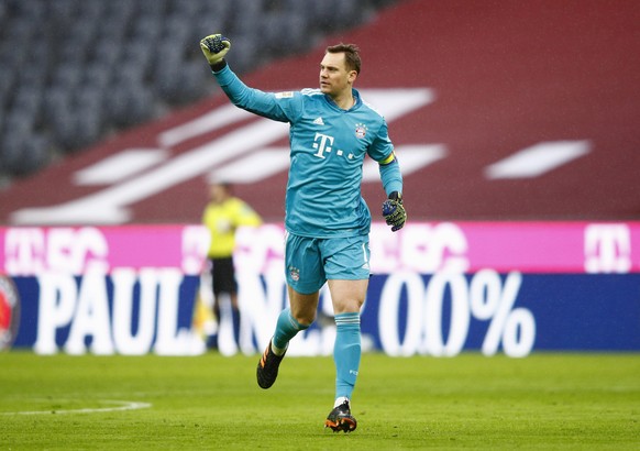 epa08975093 Goalkeeper Manuel Neuer of FC Bayern Munich celebrates the opening goal during the German Bundesliga soccer match between FC Bayern Muenchen and TSG Hoffenheim at Allianz Arena in Munich,  ...