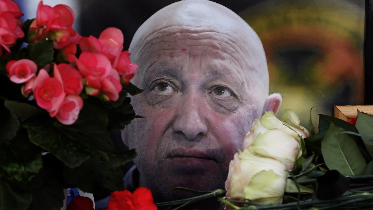 epa10894046 A portrait of PMC Wagner Group's late chief Yevgeny Prigozhin at an informal memorial on the 40th day since his death, near the Kremlin in Moscow, Russia, 01 October 2023. Russian aut ...