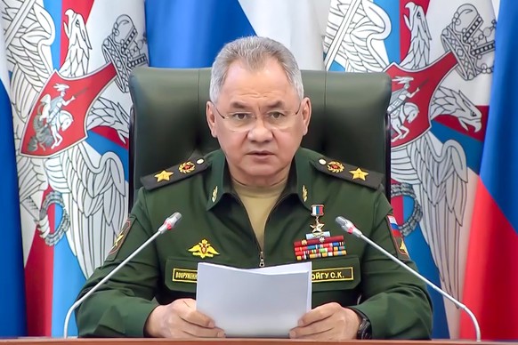 In this photo taken from video released by the Russian Defense Ministry Press Service on Wednesday, Aug. 9, 2023, Russian Defense Minister Sergei Shoigu leads a meeting of the Collegium of the Russian ...