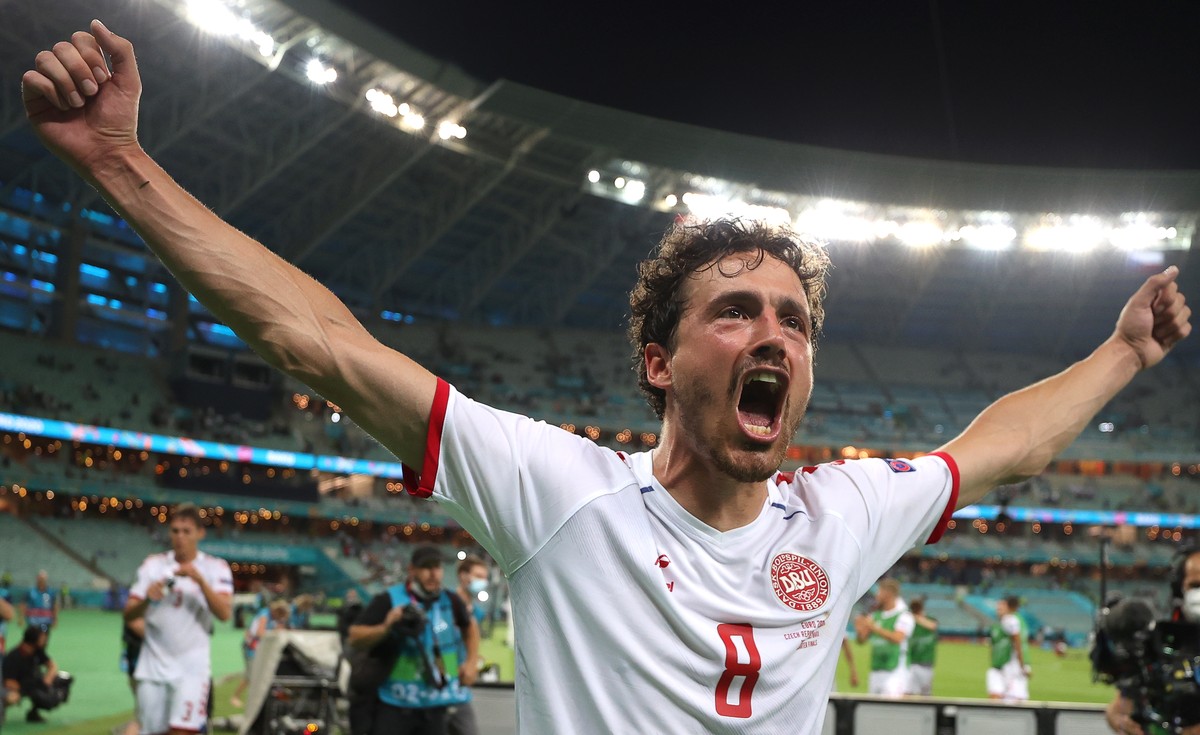 epa09321046 Denmark's Thomas Delaney celebrates after the UEFA EURO 2020 quarter final match between the Czech Republic and Denmark in Baku, Azerbaijan, 03 July 2021. EPA/Naomi Baker / POOL (REST ...