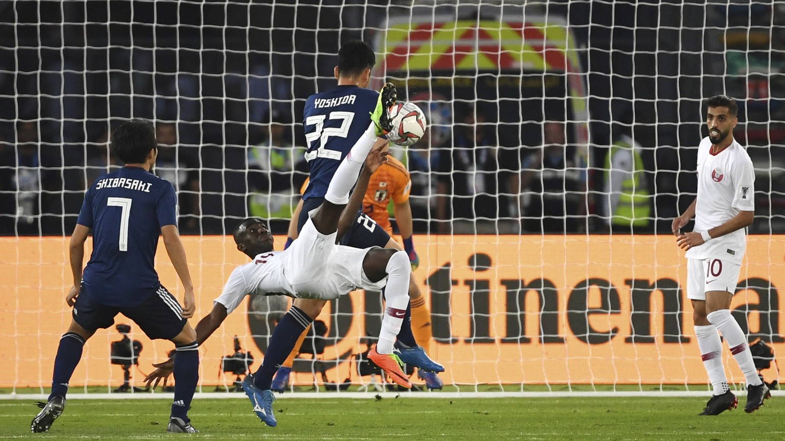 Qatar&#039;s forward Almoez Ali, center, scores his sides first goal during the AFC Asian Cup final match between Japan and Qatar in Zayed Sport City in Abu Dhabi, United Arab Emirates, Friday, Feb. 1 ...