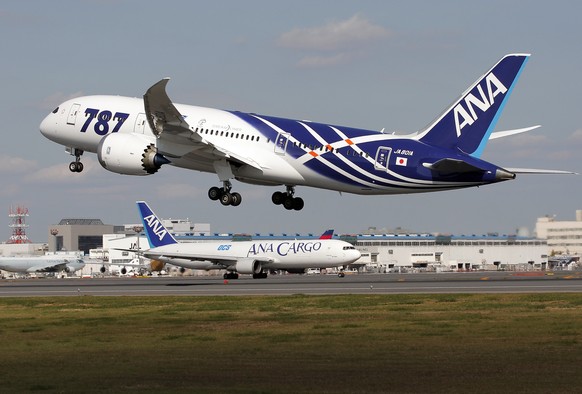 FILE - In this Wednesday, Oct. 26, 2011 file photo, All Nippon Airways Boeing 787 takes off for the airplane&#039;s inaugural commercial flight to Hong Kong at Narita International Airport in Narita,  ...