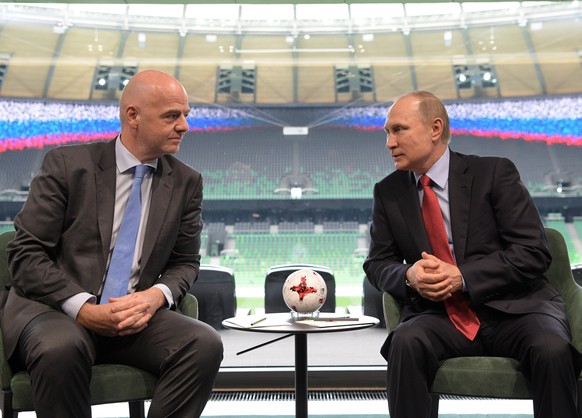 Russian President Vladimir Putin, right, meets with FIFA President Gianni Infantino at the FC Krasnodar Stadium in the southern city of Krasnodar, Russia, Tuesday, May 23, 2017. (Alexei Druzhinin/Pool ...