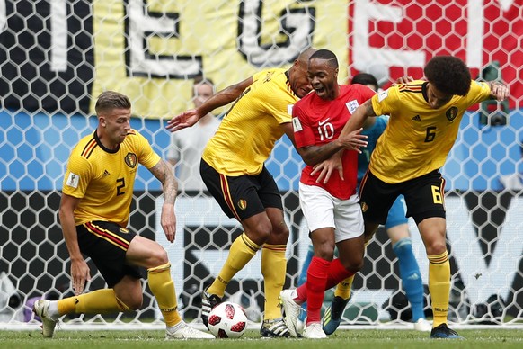 Belgium&#039;s Toby Alderweireld, from left, Belgium&#039;s Vincent Kompany, England&#039;s Raheem Sterling and Belgium&#039;s Axel Witsel challenge for the ball during the third place match between E ...