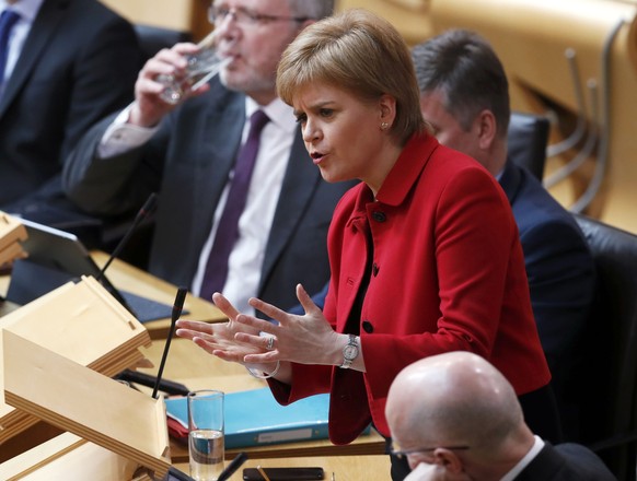 Scotland&#039;s First Minister Nicola Sturgeon attends a debate on a second referendum on independence at Scotland&#039;s Parliament in Holyrood, Edinburgh, Britain, March 28, 2017. REUTERS/Russell Ch ...