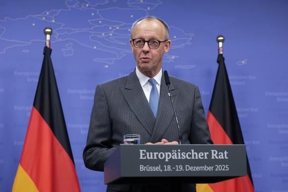 epa12602205 Chancellor of Germany Friedrich Merz speaks to the media at the end of first day of the EU Council Summit in Brussels, Belgium, 19 December 2025. EU leaders met to discuss the latest devel ...