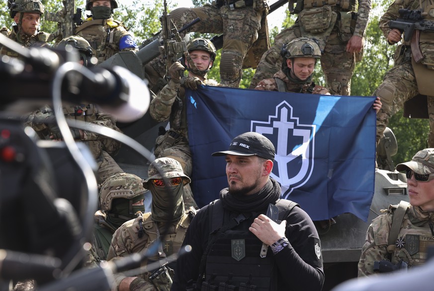 epa10650659 A &#039;Russian Volunteer Corps&#039; member nicknamed &#039;White Rex&#039; (C) attends a meeting with the media not far from the Ukraine-Russia border in Kharkiv&#039;s area, northeaster ...