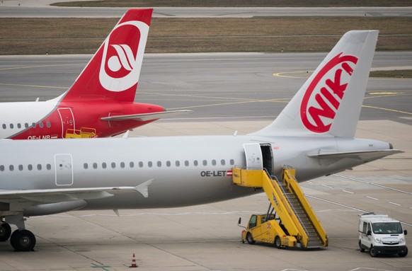 epa06387318 (FILE) - An &#039;Air Berlin&#039; aircraft (L, behind) and a &#039;Fly Niki&#039; plane (front) are parked at the Vienna International Airport (VIC) in Schwechat, Austria, 13 February 201 ...