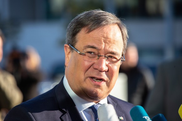 epa07093943 Armin Laschet (C), the Prime Minister of the German Federal state of North Rhine-Westphalia, speaks to the media as he arrives for a meeting of the Christian Democratic Union presidium at  ...