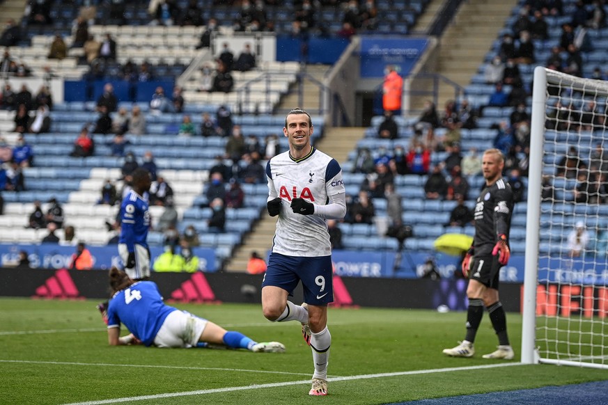 epa09223441 Gareth Bale (C) of Tottenham celebrates after scoring the 3-2 lead during the English Premier League soccer match between Leicester City and Tottenham Hotspur in Leicester, Britain, 23 May ...
