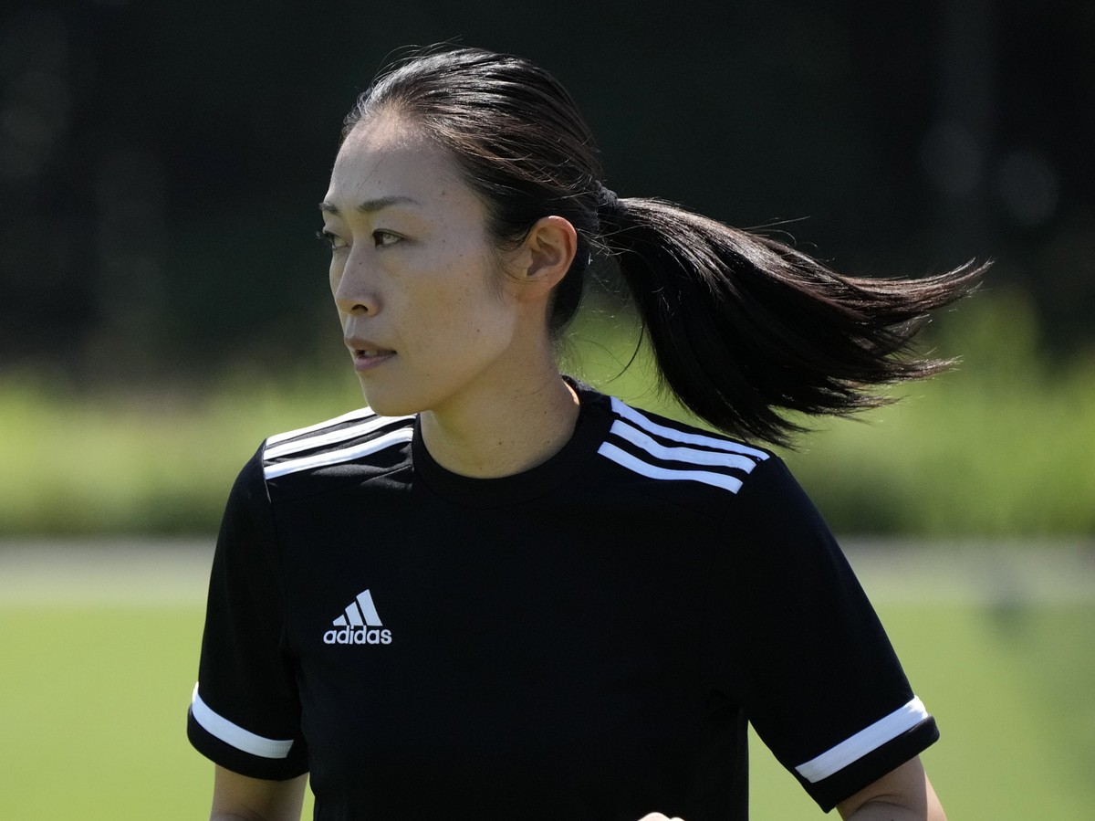 FILE - Japanese referee Yoshimi Yamashita warms up during a training session Monday, June 27, 2022, at JFA YUME Field in Chiba, near Tokyo. (AP Photo/Eugene Hoshiko, File)
Yoshimi Yamashita