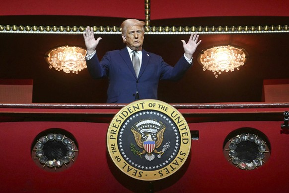 President Donald Trump stands in the presidential box as he tours the John F. Kennedy Center for the Performing Arts in Washington, Monday, March 17, 2025. (Pool via AP)
Trump