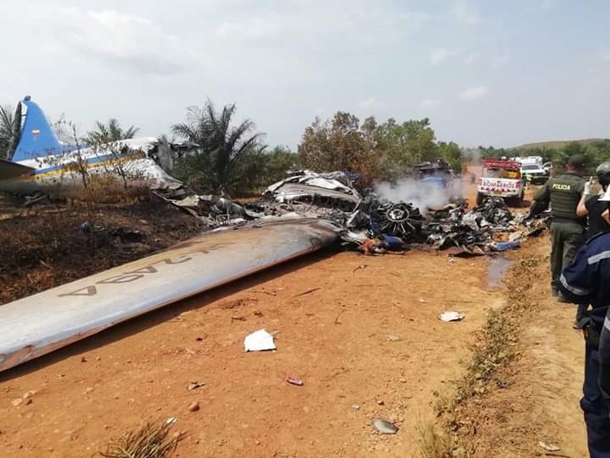 epa07426156 A handout photo made available by the Defensa Civil Colombiana shows the scene of an airplane accident in the village of La Bendicion, municipality of San Martin, Meta, Colombia, 09 March  ...