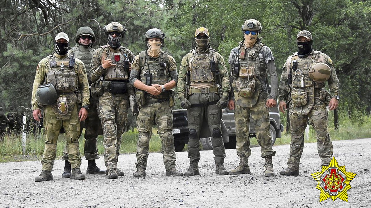 FILE - In this photo released by Belarus' Defense Ministry on Thursday, July 20, 2023, Belarusian soldiers of the Special Operations Forces (SOF) and mercenary fighters from Wagner private milita ...