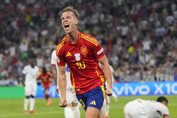 Spain&#039;s Dani Olmo celebrates after scoring his side&#039;s second goal during a semifinal match between Spain and France at the Euro 2024 soccer tournament in Munich, Germany, Tuesday, July 9, 20 ...