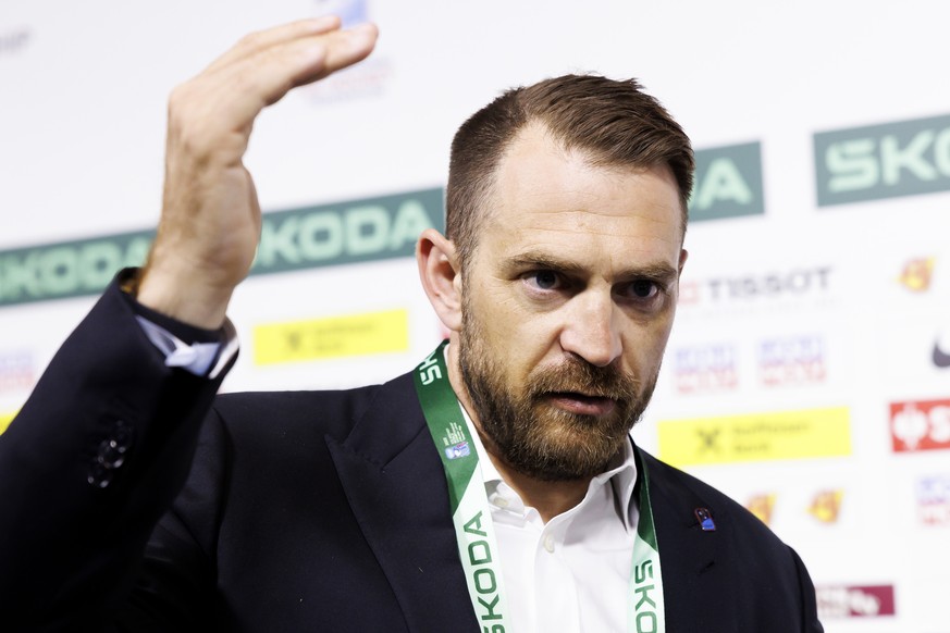 Switzerland's Raeto Raffainer, Member Council of IIHF Switzerland, speaks during an interview with Keystone-SDA journalist, at the mixed zone of the Riga Arena, at the IIHF 2023 World Championshi ...