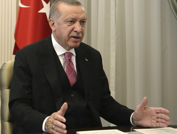 Turkey&#039;s President Recep Tayyip Erdogan speaks to the members of his ruling party in a televised address, in Ankara, Turkey, Wednesday, July 1, 2020. Erdogan vowed on Wednesday to tighten governm ...