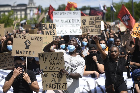 epa08482491 People demonstrate against racism after the worldwide movement of the Black Lives Matter (BLM) protest against the recent death of George Floyd in Zurich, Switzerland, 13 June 2020. Floyd, ...