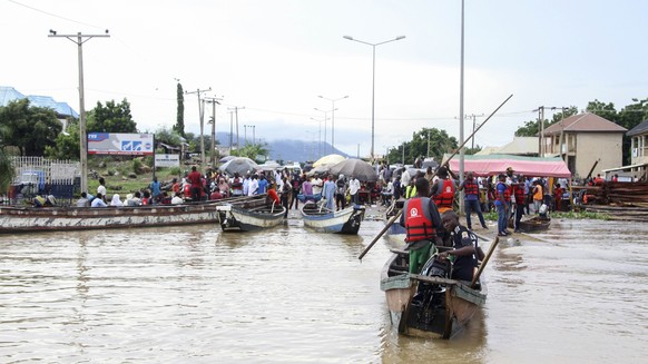 People stranded due to floods following several days of downpours In Kogi Nigeria, Thursday, Oct. 6, 2022. Thousands of travelers remained stranded in Nigeria&#039;s northcentral Kogi state after majo ...