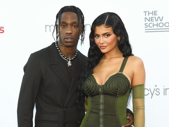 Recording artist Travis Scott, left, and Kylie Jenner, right, attend the 72nd annual Parsons Benefit presented by The New School at The Rooftop at Pier 17 on Tuesday, June 15, 2021, in New York. (Phot ...