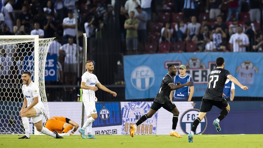 epa10094451 Qarabag FK&#039;s Kwabwena Owusu, 2nd right celebrates next to Ramil Sheydaev, right, after after scoring a goal against FC Zurich during the UEFA Champions League qualifying second round, ...