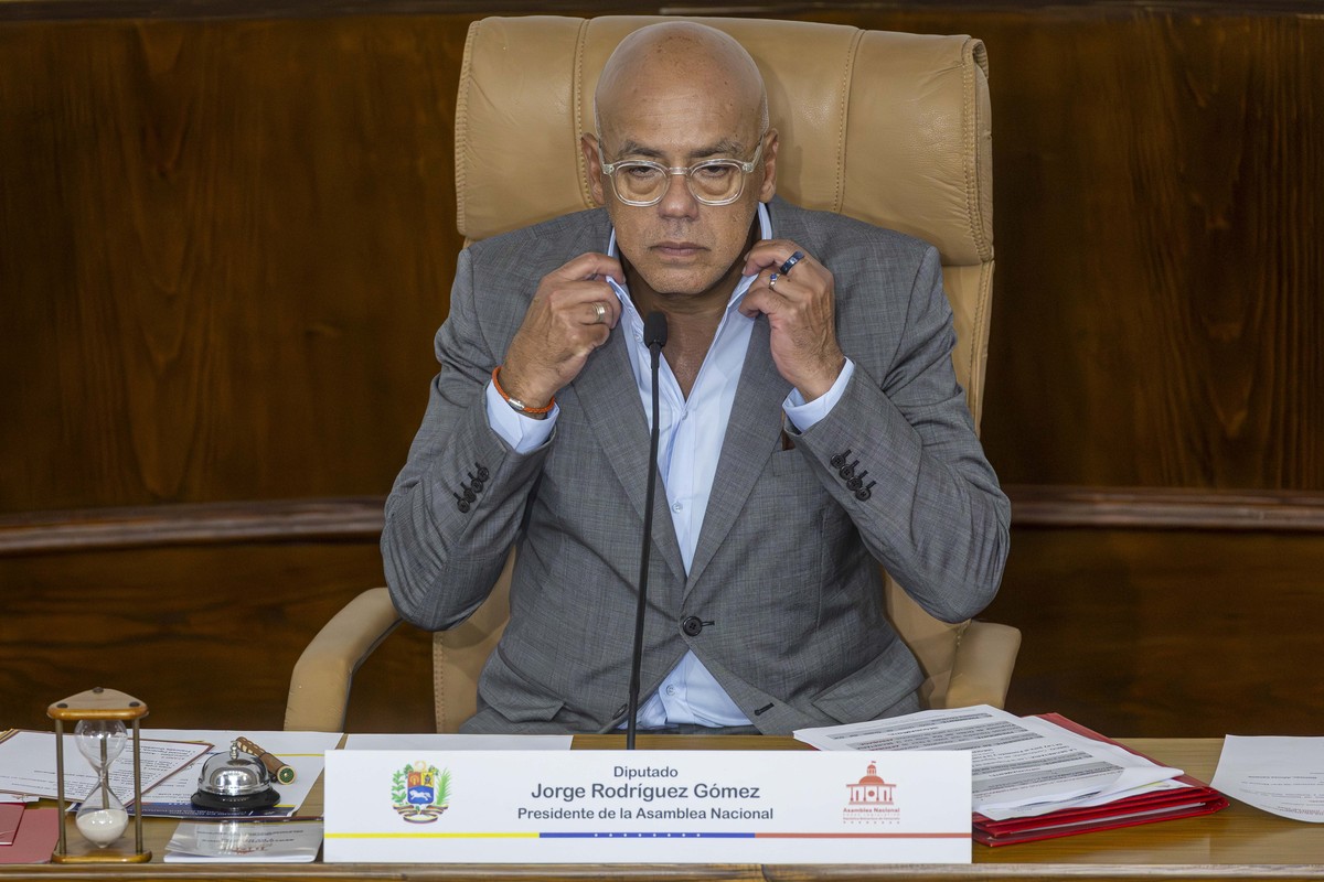 epa13016915 Jorge Rodriguez, president of the National Assembly, reacts during a regular session in which the Bill for the Development and Promotion of Coffee is being debated on its second reading, i ...