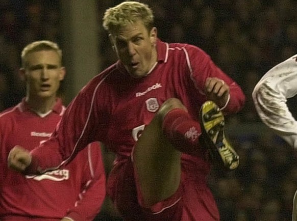 Liverpool&#039;s Stephane Henchoz, left, clears the ball as Gabriel Batitusta runs in during the UEFA Cup 4th Round 2nd Leg, being played at Anfield Stadium, between Liverpool FC and AS Roma Thursday  ...