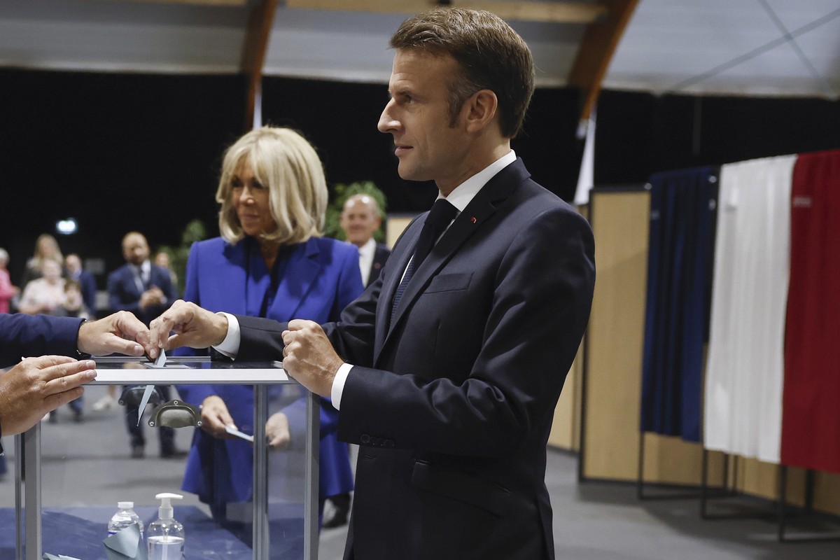 French President Emmanuel Macron votes for the second round of the legislative elections in Le Touquet-Paris-Plage, northern France, Sunday July 7 2024. Voting has begun in mainland France on Sunday i ...