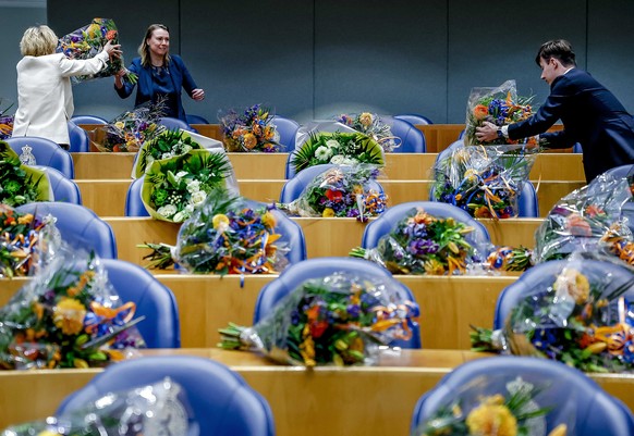 epa11013734 Flowers are placed prior to the swearing-in of the new members of the House of Representatives in The Hague, The Netherlands, 06 December 2023. Eighty members of parliament (MPs) said good ...