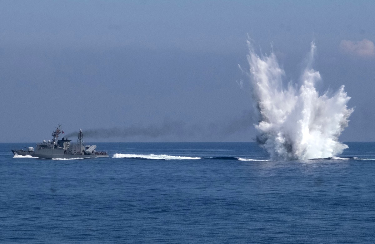 FILE - A Ching Chiang class patrol ship fires off depth charges underwater as part of a navy demonstration in Taiwan's annual Han Kuang exercises off the island's eastern coast near the city ...