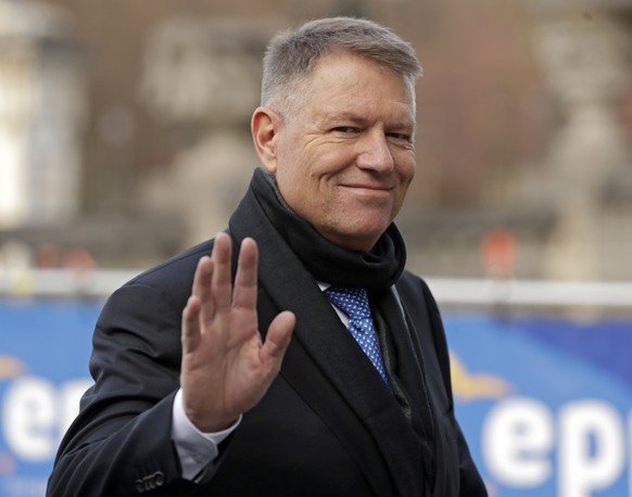 epa08064998 Romanian President Klaus Iohannis arrives for the European People&#039;s Party (EPP) leaders meeting ahead to European summit in Brussels, Belgium, 12 December 2019. An European Council me ...