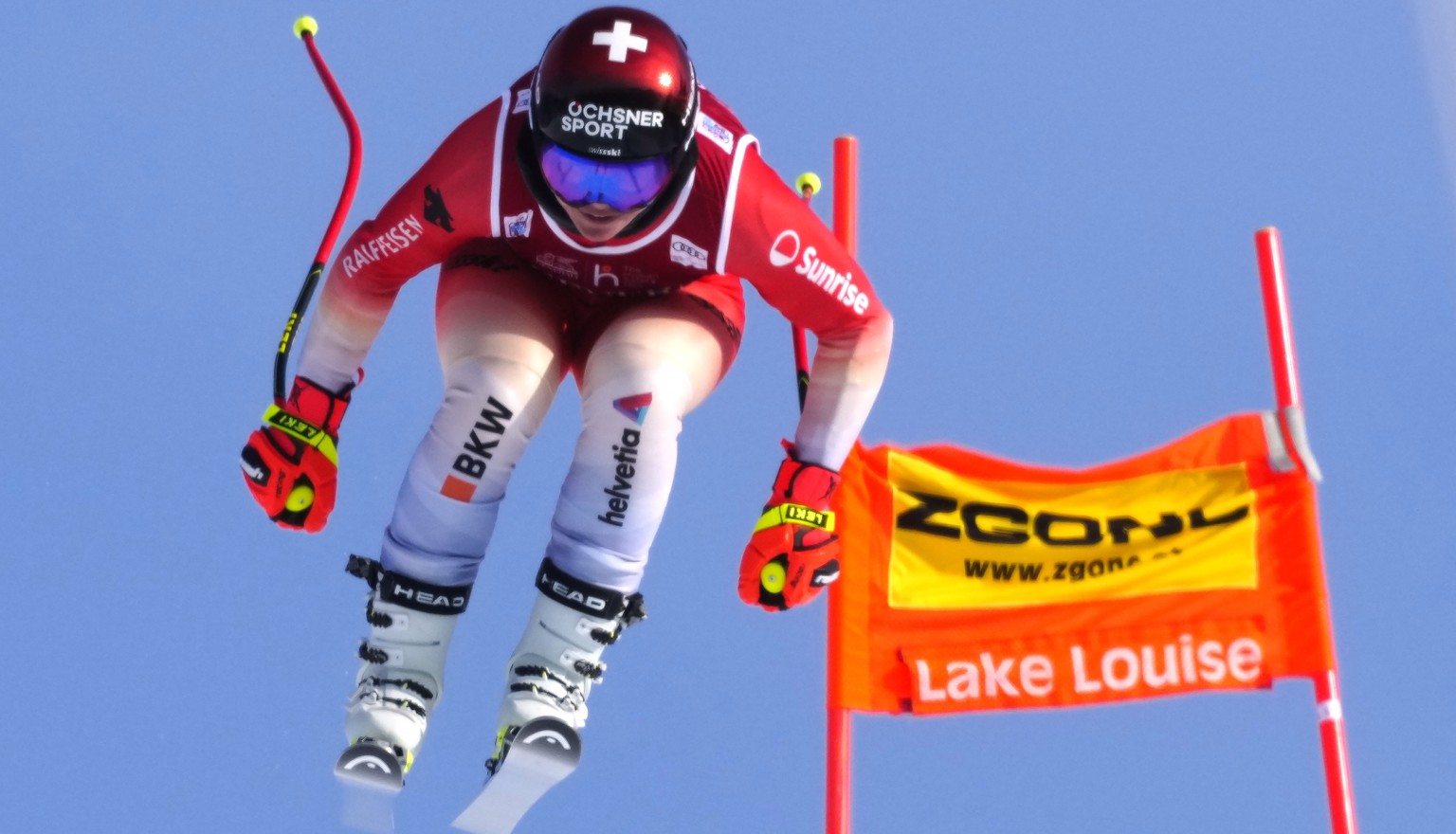 Corinne Suter of Switzerland flies down the course during a women&#039;s World Cup downhill skiing practice run in Lake Louise, Alberta, Tuesday, Nov. 29, 2022. (Frank Gunn/The Canadian Press via AP)