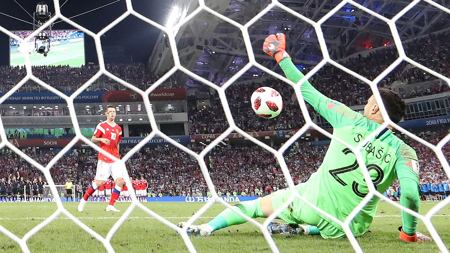 epa06872822 Goalkeeper Dominik Livakovic of Croatia saves the penalty of Fedor Smolov of Russia during the FIFA World Cup 2018 quarter final soccer match between Russia and Croatia in Sochi, Russia, 0 ...