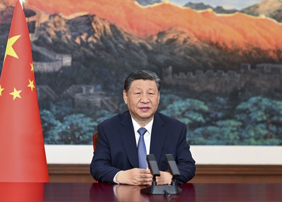 epa11406164 Chinese President Xi Jinping delivers a video speech to the opening ceremony of the celebration for the 60th anniversary of the United Nations Conference on Trade and Development (UNCTAD), ...