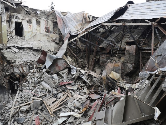FILE - Rubble from the damaged Donetsk Academic Regional Drama Theatre sits after the March 16, 2022, bombing in Mariupol, Ukraine, in an area now controlled by Russian-backed separatist forces, on Mo ...