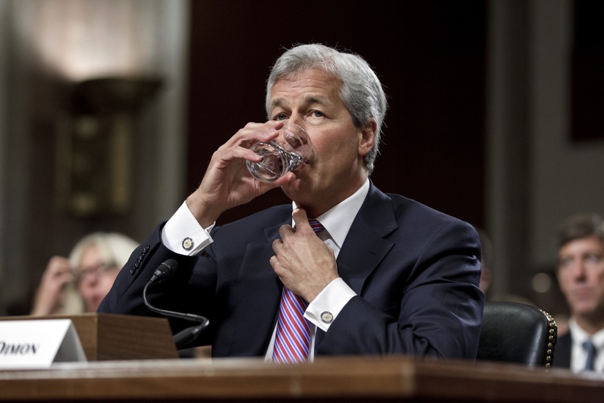 FILE - In this Wednesday, June 13, 2014, file photo, JPMorgan Chase CEO Jamie Dimon testifies on Capitol Hill in Washington. Dimon has throat cancer that will require radiation and chemotherapy treatm ...