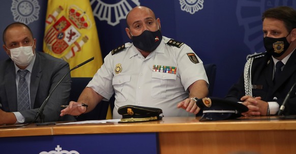 epa09491263 Spanish National Police illegal drugs superintendent Antonio Martinez (C) addresses a press conference to inform on &#039;Musala&#039; police operation at Spanish National Police headquart ...