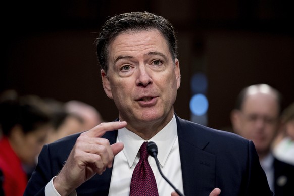 FILE - In this June 8, 2017, file photo, former FBI director James Comey speaks on Capitol Hill in Washington. Comey will give a series of lectures at Howard University, the historically black college ...