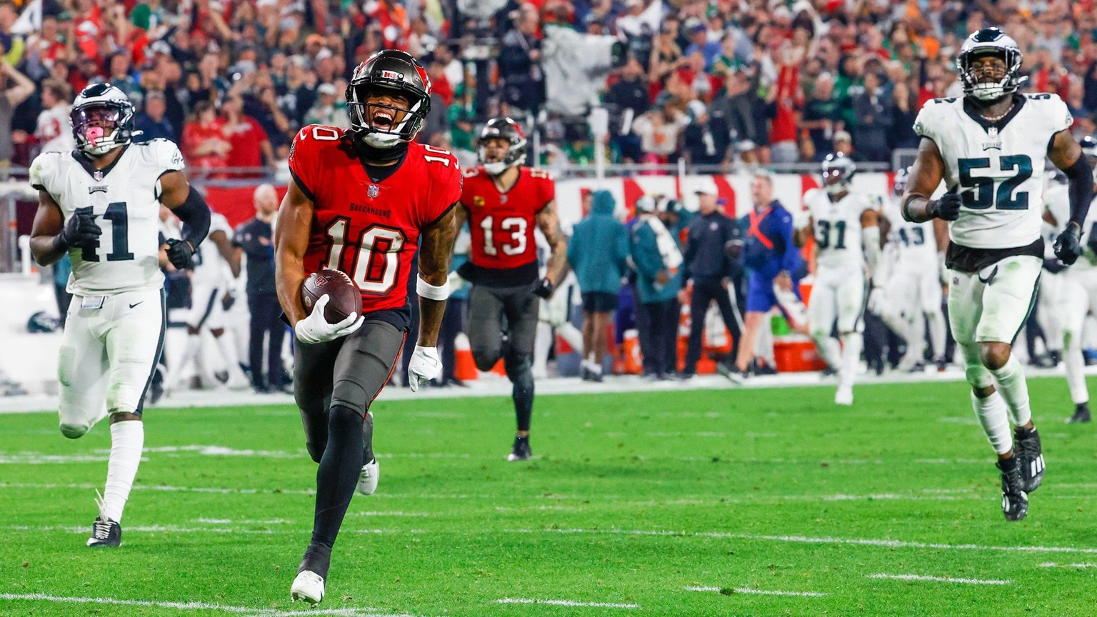 January 15, 2024, Florida, USA: Tampa Bay Buccaneers wide receiver Trey Palmer 10 reacts as he scores a touchdown in the third quarter against the Philadelphia Eagles of the NFC Wildcard game at Raymo ...