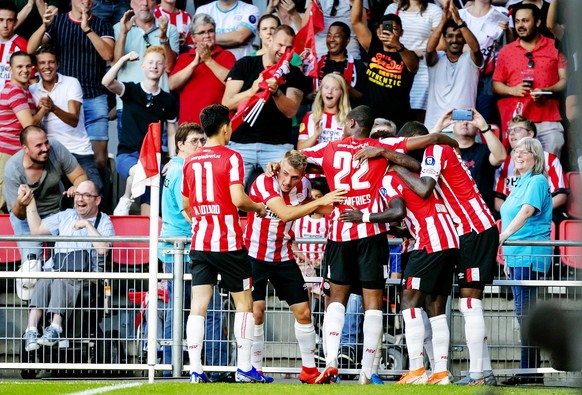 epa07735923 PSV Eindhoven player Steven Bergwijn reacts after scoring the 1-0 against FC Basel during the second qualifying round for the Champions League match in Eindhoven, the Netherlands, 23 July  ...