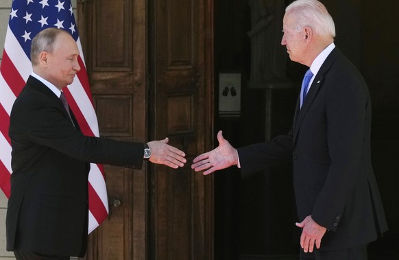 FILE - President Joe Biden and Russian President Vladimir Putin, arrive to meet at the &#039;Villa la Grange&#039;, in Geneva, Switzerland, June 16, 2021. (AP Photo/Alexander Zemlianichenko, File Pool ...