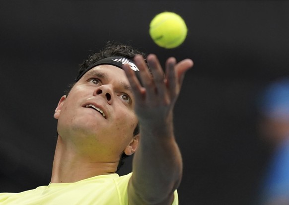 Canada&#039;s Milos Raonic serves to Chile&#039;s Cristian Garin during their second round singles match at the Australian Open tennis championship in Melbourne, Australia, Wednesday, Jan. 22, 2020. ( ...