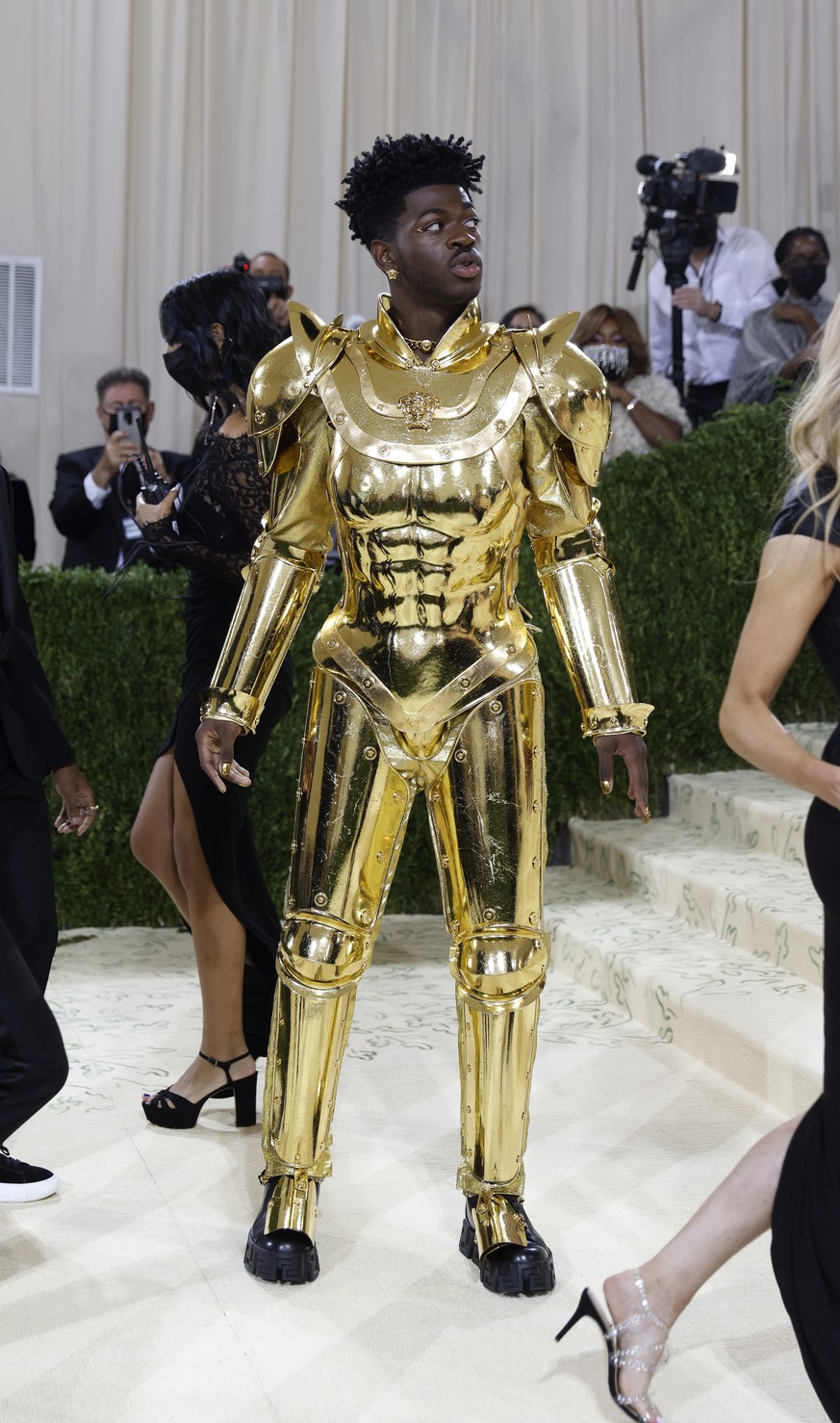 epa09466776 Lil Nas X poses on the red carpet for the 2021 Met Gala, the annual benefit for the Metropolitan Museum of Art&#039;s Costume Institute, in New York, New York, USA, 13 September 2021. The  ...