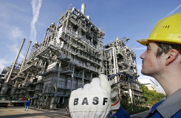 epa04858492 (FILE) A file picture dated 27 October 2005, showing a member of staff of chemical group BASF standing in front of the plant installation &#039;Steamcracker II&#039; in Ludwigshafen, Germa ...