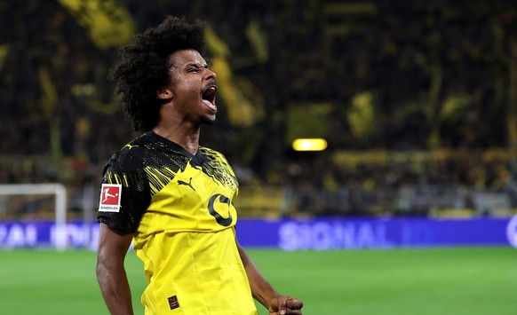 epa12396462 Karim Adeyemi of Dortmund celebrates scoring the 1-0 goal during the German Bundesliga soccer match between Borussia Dortmund and VfL Wolfsburg in Dortmund, Germany, 21 September 2025. EPA ...
